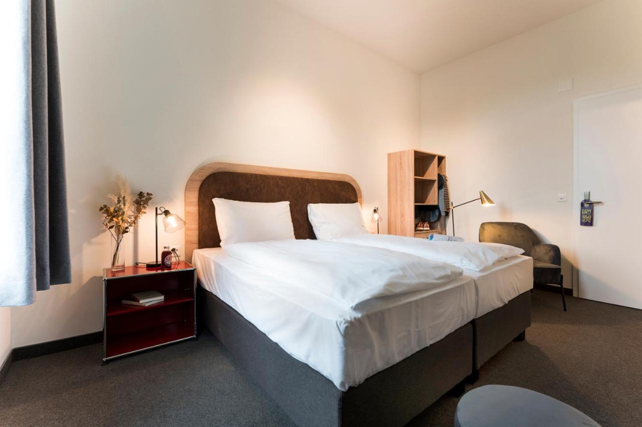 Koncept Hotel Loeie Мюнзинген Экстерьер фото